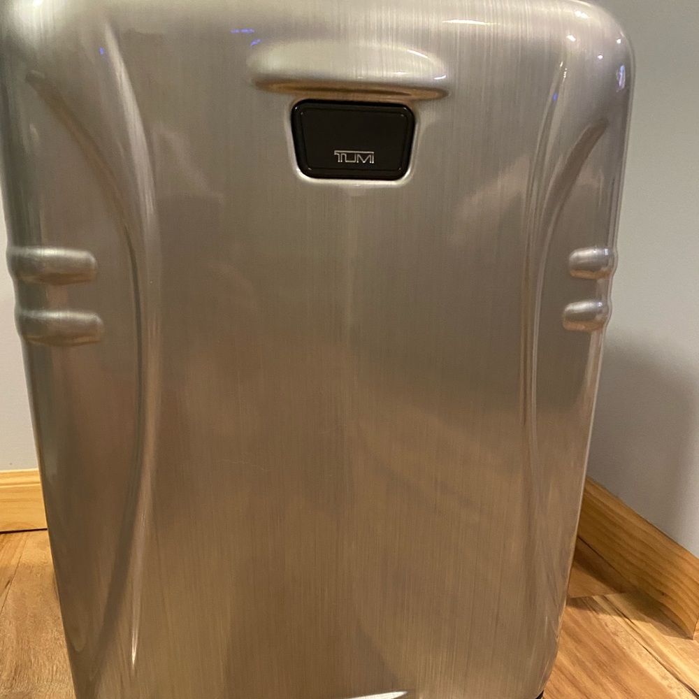 NWT TUMI hard shell carryon suitcase - silver